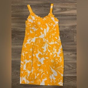 Trina Turk dress.  Size: 10.  Hidden zipper on back.  Cute ruffles!